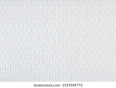 Polyethylene bubble wrap used to pack and ship fragile items in boxes.